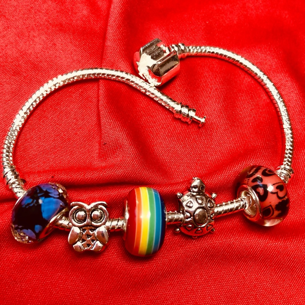 NWOT 925 sterling silver bracelet,5 FREE beads of your choice.Snake chain,barrel